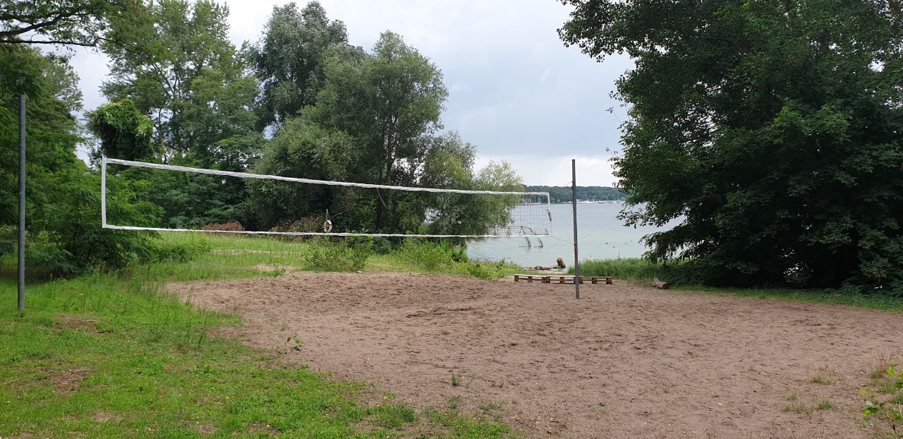 Beach volleyball net by the lake